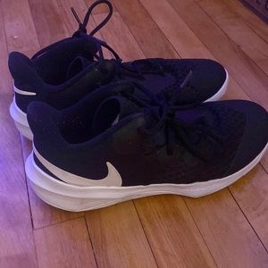Black Nike court shoes